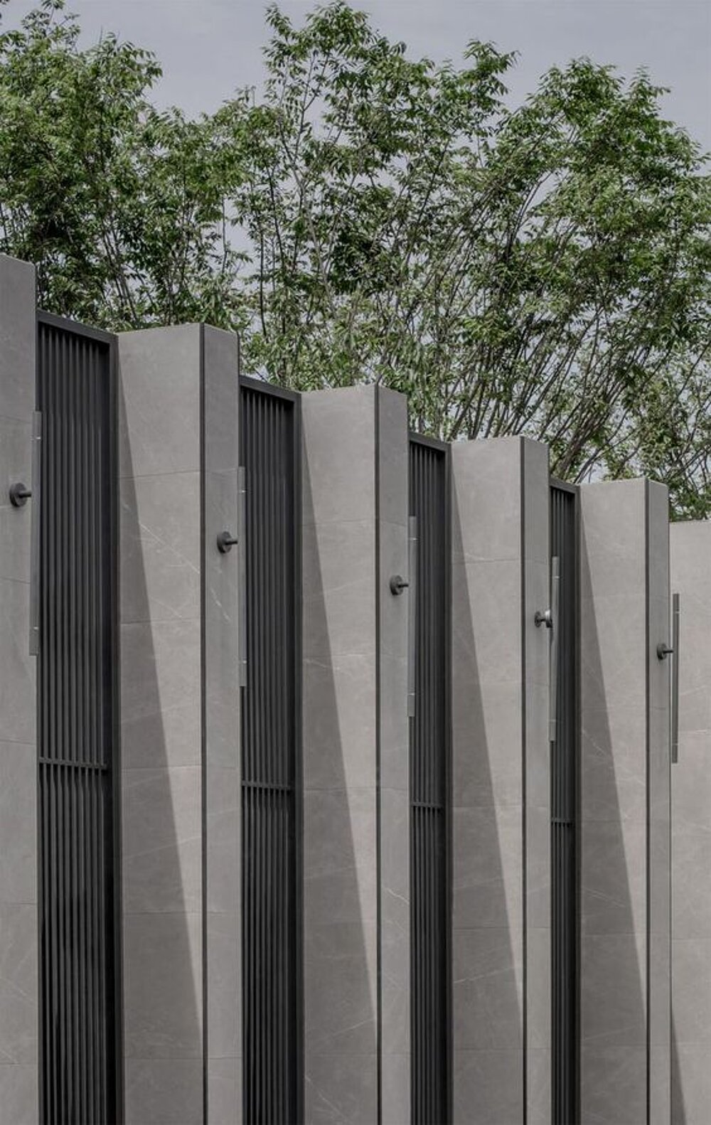 Vertical timber façade with a textured surface