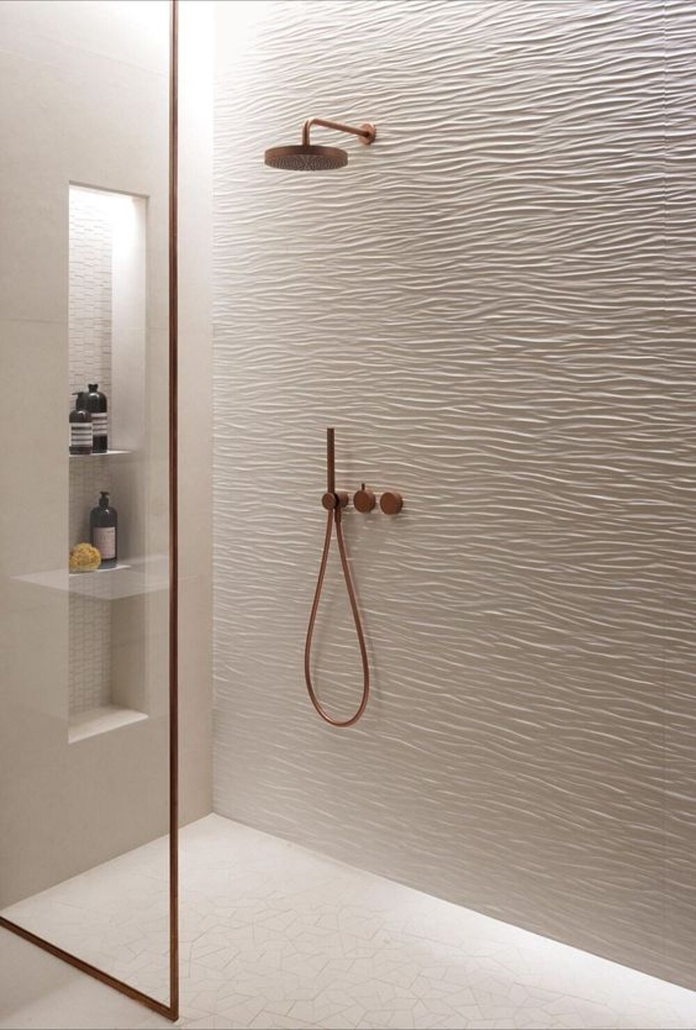 Walk-in shower with a textured feature wall