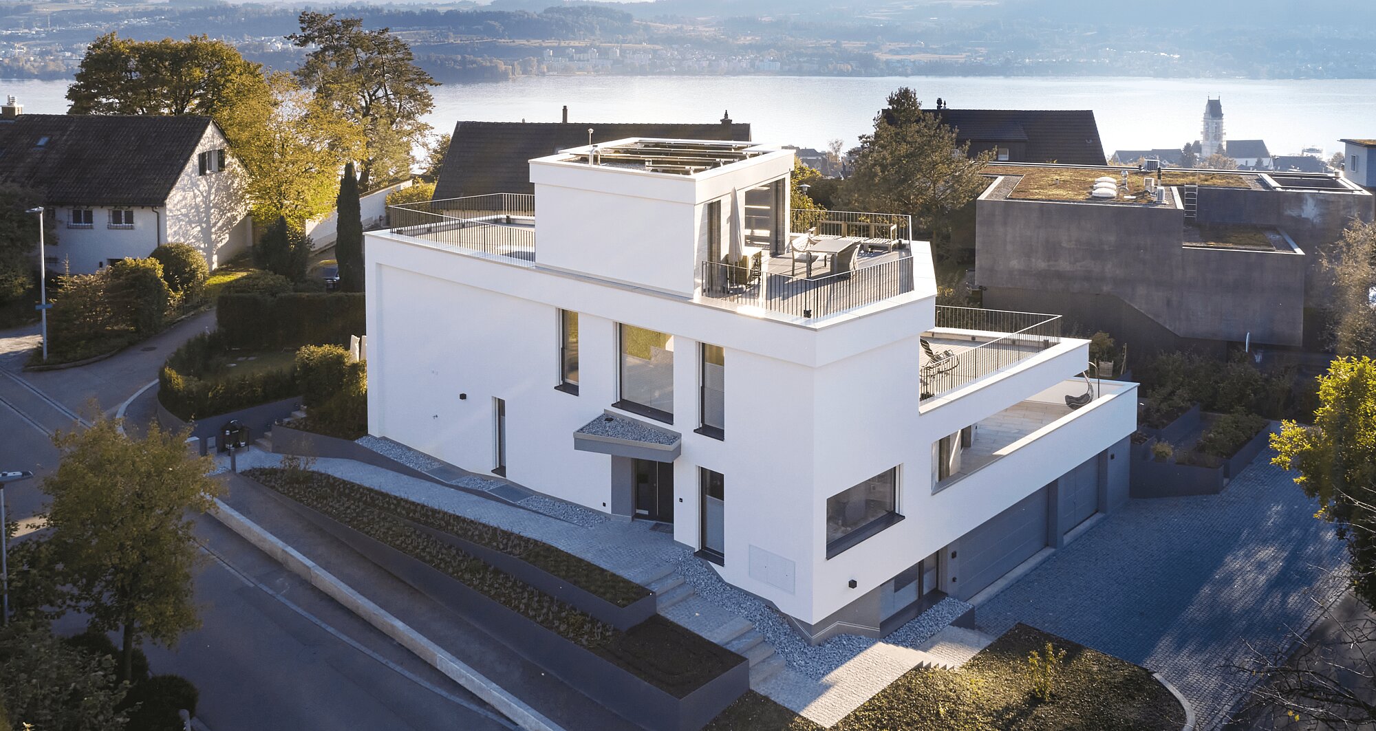 Exterior view of the KOENIGSEGG detached house, drone shot