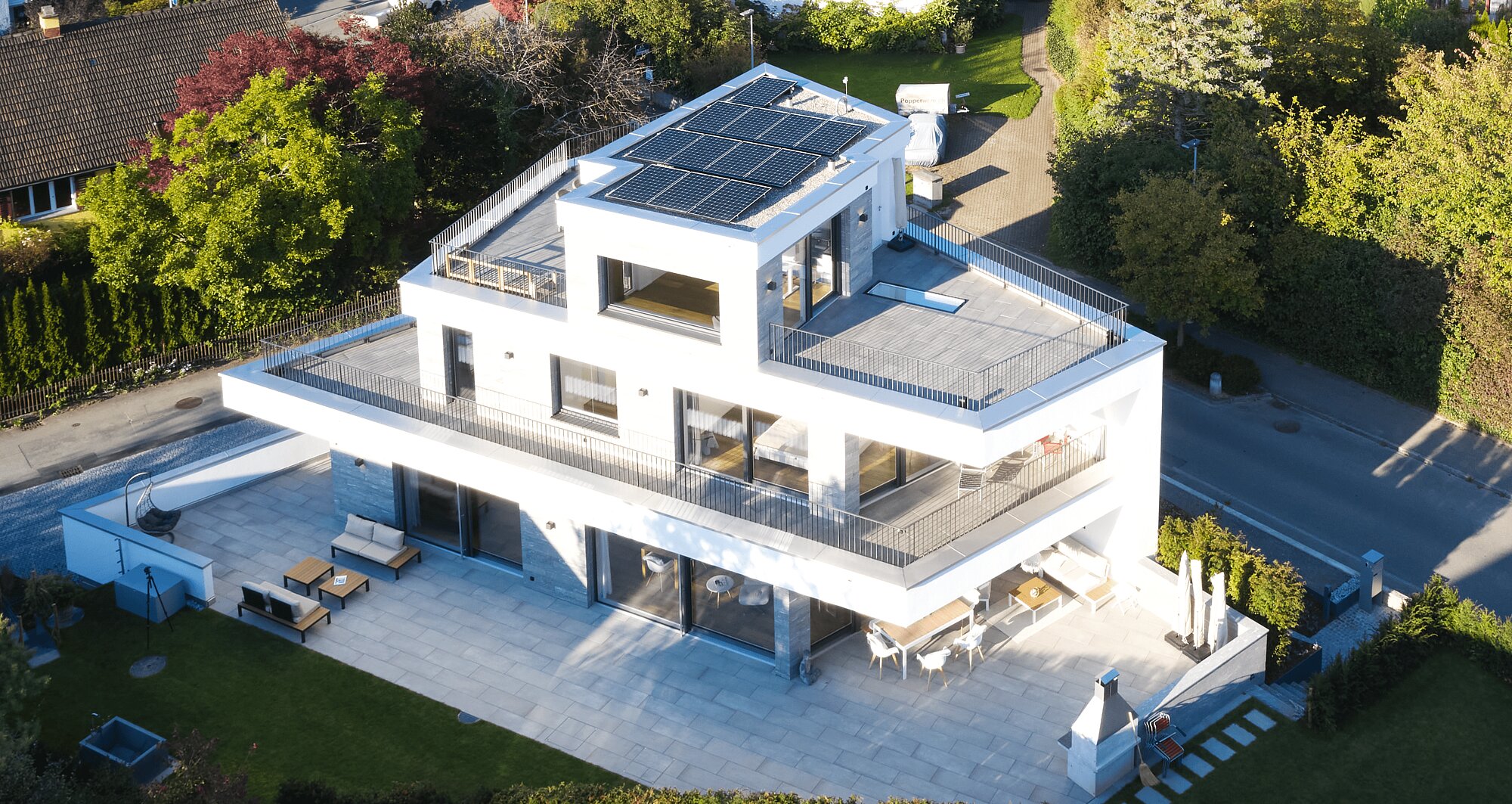 Exterior view of the KOENIGSEGG detached house, drone shot