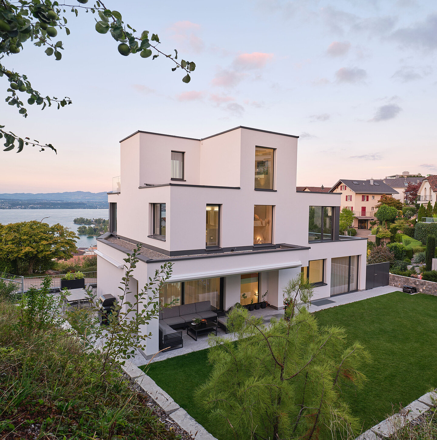 Exterior view of the COAST detached house, garden