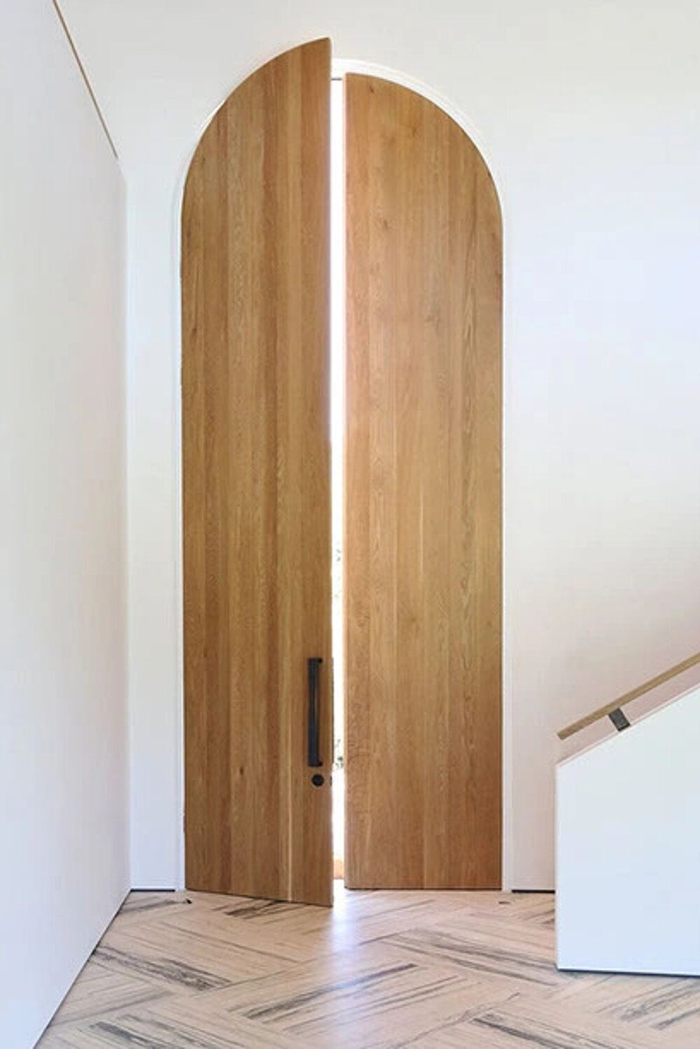 Arched timber entrance door